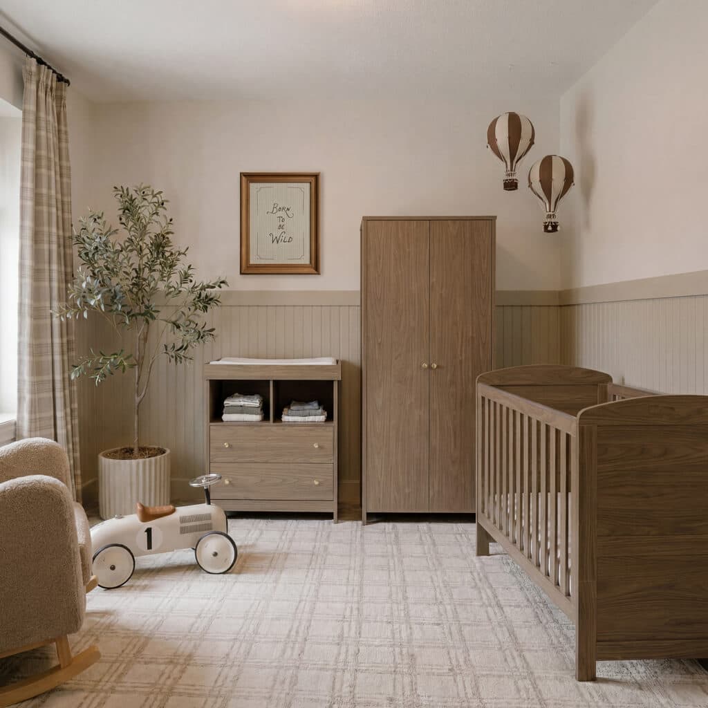 Seeker nursery styled with warm wood furniture and neutral panelling