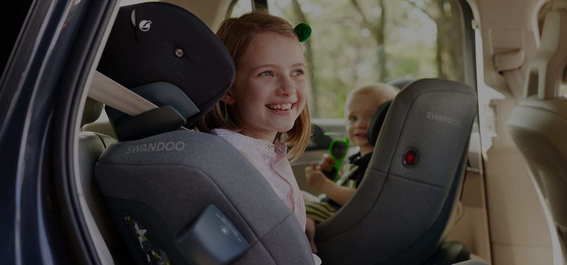 Children travelling together in Swandoo car seats