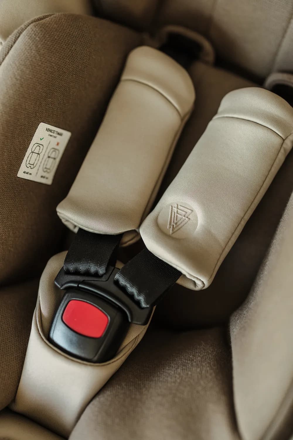 Harness detail on a Venicci Tiago 360 i-Size infant car seat